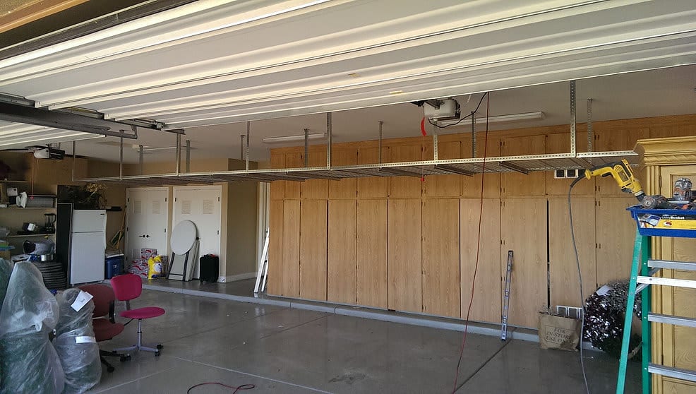 Heavy duty garage ceiling storage system setup in Orlando, FL creating extra space for storage